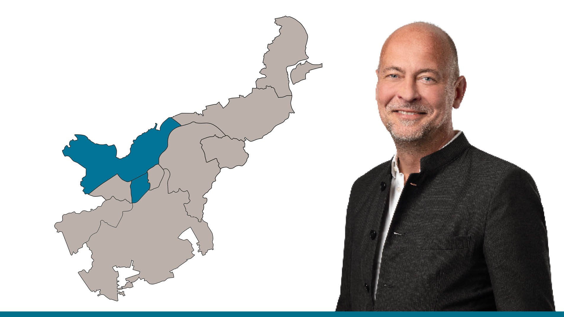 Der Ansprechpartner vor einer Lübeck-Karte, der Vermietungsbereich ist hervorgehoben.